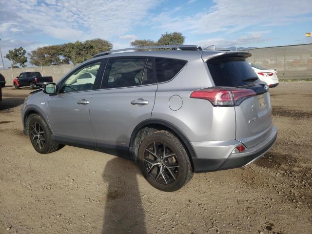 JTMJJREV3HD124102 - 2017 TOYOTA RAV4 HV SE SILVER photo 2