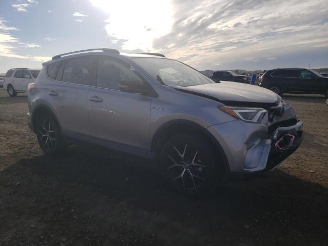 JTMJJREV3HD124102 - 2017 TOYOTA RAV4 HV SE SILVER photo 4