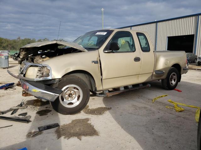1FTZX0724YKA38308 - 2000 FORD F150 GOLD photo 1