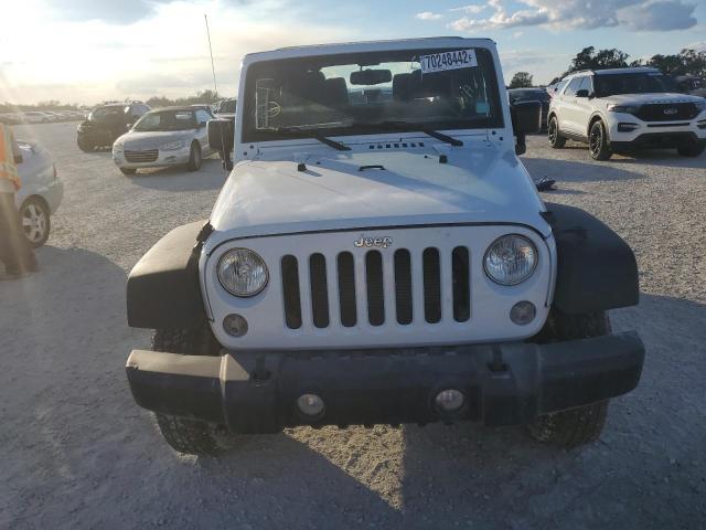 1C4GJWAG7GL224062 - 2016 JEEP WRANGLER S WHITE photo 5
