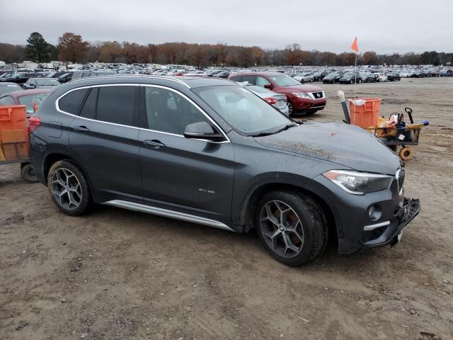 WBXHT3C30G5F63957 - 2016 BMW X1 XDRIVE2 GRAY photo 4