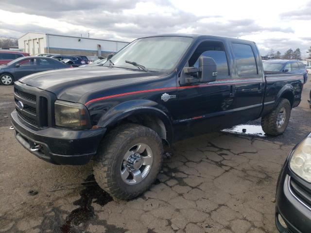 1FTSW31P44EC46871 - 2004 FORD F350 SRW S BLACK photo 5