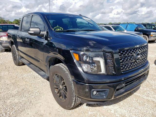 1N6AA1E67JN528558 - 2018 NISSAN TITAN SV BLACK photo 1