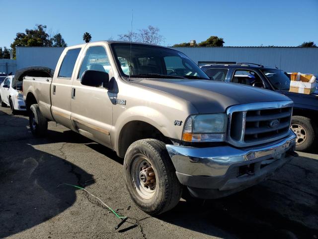 1FTSW31S23EC42711 - 2003 FORD F350 SRW S TAN photo 4