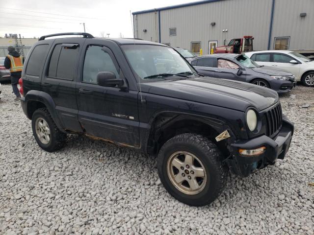 1J4GL58K92W223768 - 2002 JEEP LIBERTY LI BLACK photo 4