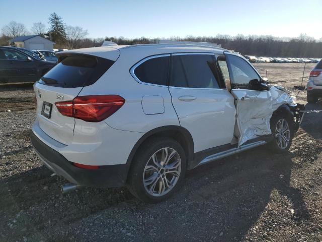 WBXHT3C39H5F86235 - 2017 BMW X1 XDRIVE2 WHITE photo 3