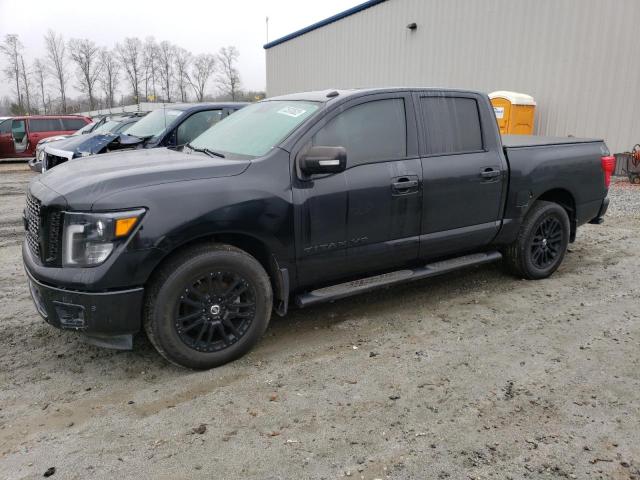 1N6AA1E64KN502890 - 2019 NISSAN TITAN PLAT BLACK photo 1