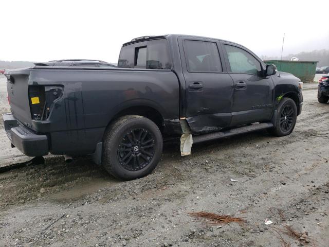 1N6AA1E64KN502890 - 2019 NISSAN TITAN PLAT BLACK photo 3