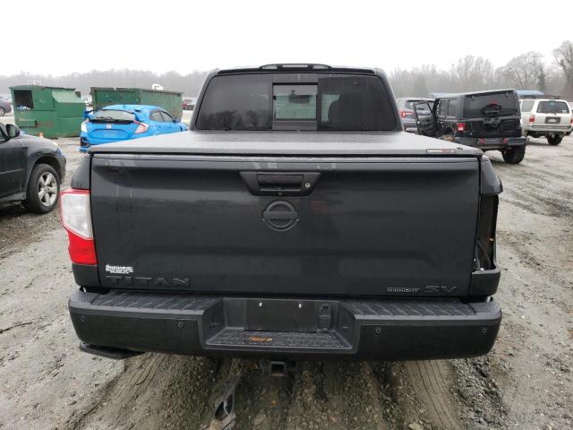 1N6AA1E64KN502890 - 2019 NISSAN TITAN PLAT BLACK photo 6