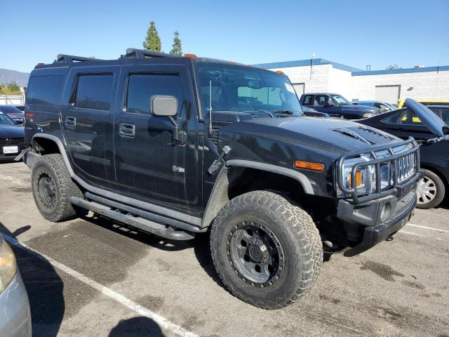 5GRGN23U45H116013 - 2005 HUMMER H2 BLACK photo 4