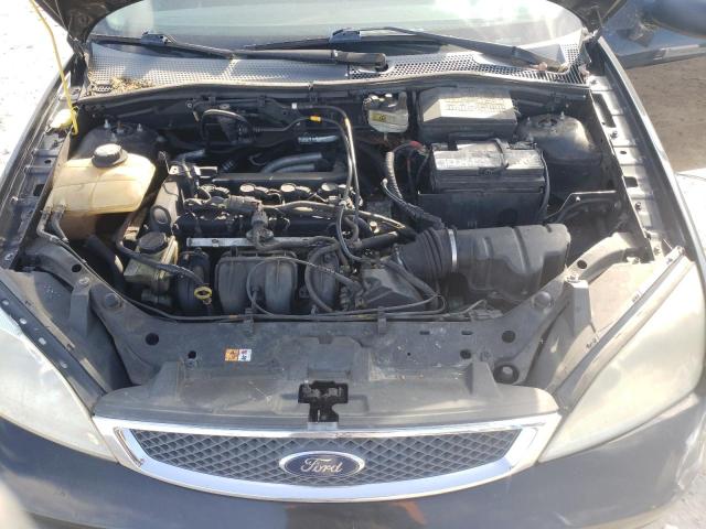 1FAFP31N37W194103 - 2007 FORD FOCUS BLACK photo 11