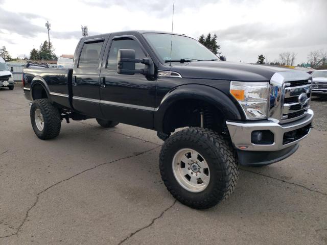 1FT8W3BT4FEB23497 - 2015 FORD F350 SUPER BLACK photo 4