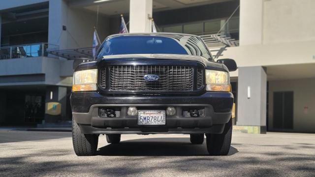 1FMNU42LX2EA53671 - 2002 FORD EXCURSION BLACK photo 11