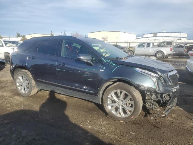 1GYKNGRS7LZ218549 - 2020 CADILLAC XT5 SPORT BLUE photo 4