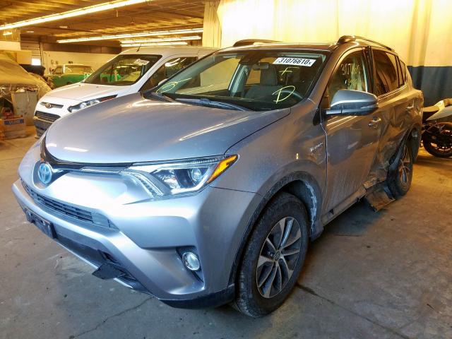 JTMRJREV6JD164375 - 2018 TOYOTA RAV4 HV LE  photo 2