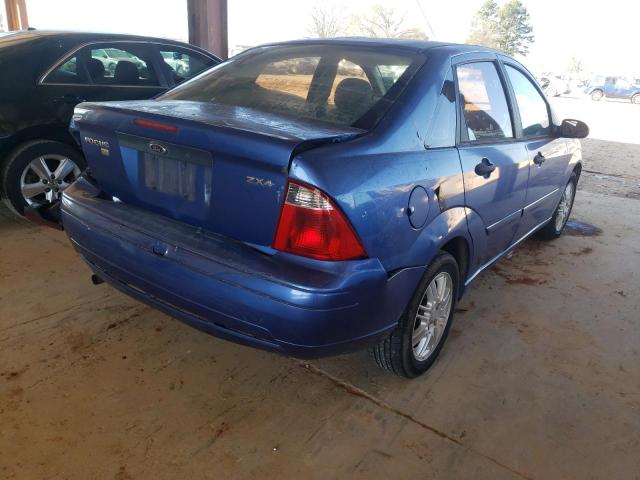 1FAFP34N35W116753 - 2005 FORD FOCUS ZX4 BLUE photo 4