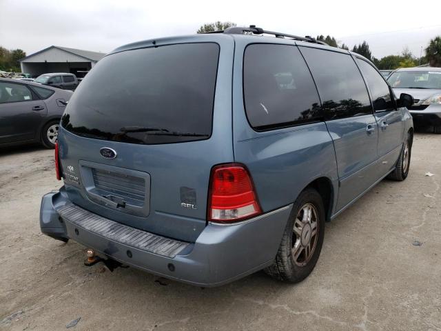 2FMZA52294BA02698 - 2004 FORD FREESTAR SEL BLUE photo 4