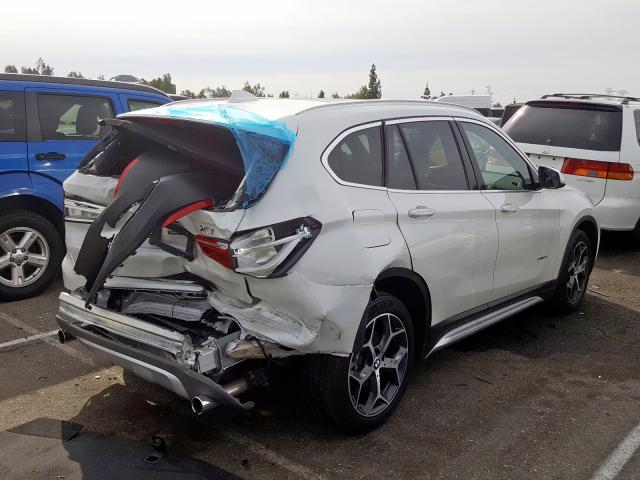 WBXHU7C39J5H41361 - 2018 BMW X1 SDRIVE28I  фото 4