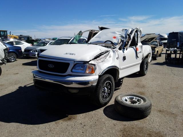 1FTRX18L0XKA73469 - 1999 FORD F150 WHITE photo 2