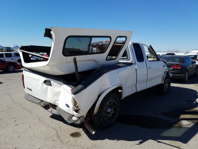 1FTRX18L0XKA73469 - 1999 FORD F150 WHITE photo 4