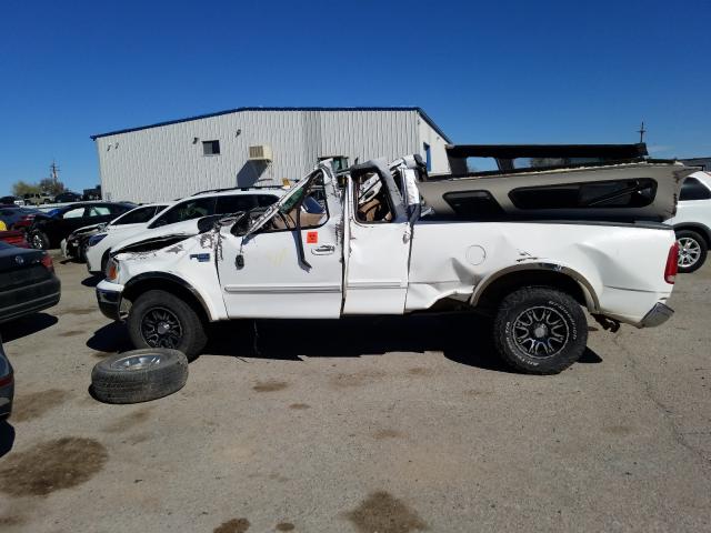 1FTRX18L0XKA73469 - 1999 FORD F150 WHITE photo 9