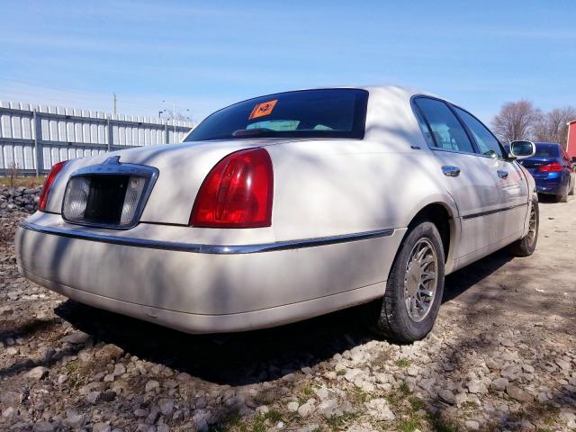 1LNHM82W1YY759465 - 2000 LINCOLN TOWN CAR SIGNATURE  photo 4