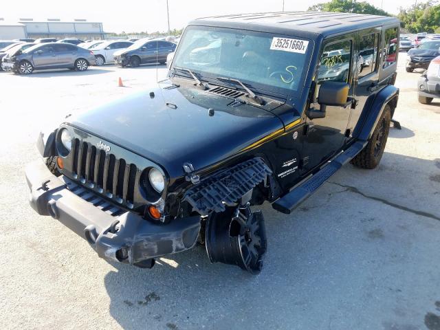 1J4BA5H16BL611145 - 2011 JEEP WRANGLER UNLIMITED SAHARA  photo 2