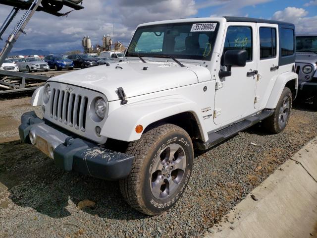 1C4HJWEG9JL920637 - 2018 JEEP WRANGLER UNLIMITED SAHARA  photo 2