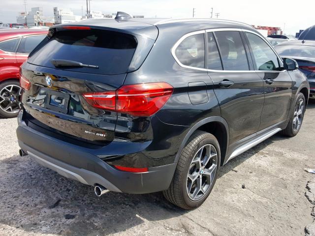 WBXHU7C59K5L12186 - 2019 BMW X1 SDRIVE28I  фото 4