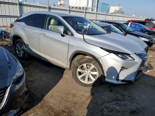 2T2BZMCA5HC071122 - 2017 LEXUS RX 350 BASE SILVER photo 4