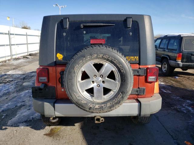 1J4GA59149L761544 - 2009 JEEP WRANGLER SAHARA ORANGE photo 6