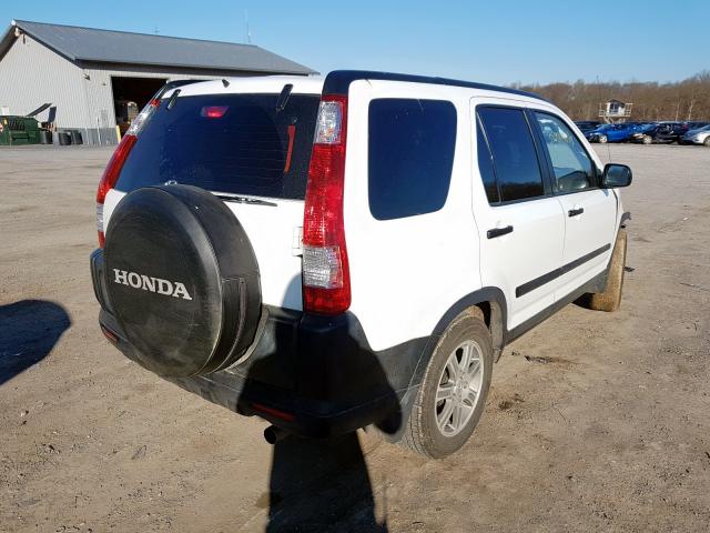 JHLRD68576C029486 - 2006 HONDA CR-V LX  photo 4