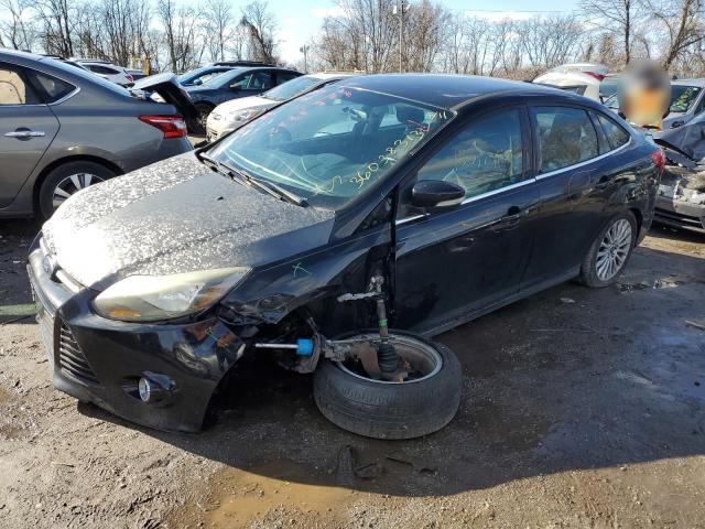 1FAHP3J29CL214249 - 2012 FORD FOCUS TITANIUM BLACK photo 1