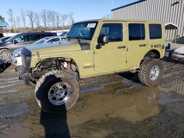 1C4BJWEG8DL611915 - 2013 JEEP WRANGLER U SAHARA GREEN photo 1