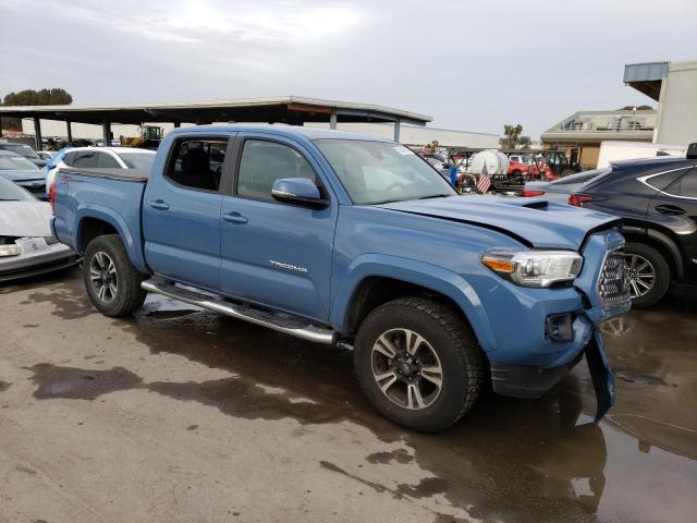 3TMAZ5CN5KM092270 - 2019 TOYOTA TACOMA DOUBLE CAB BLUE photo 4