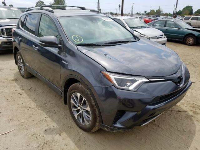 JTMRJREV9JD240252 - 2018 TOYOTA RAV4 HV LE  photo 1