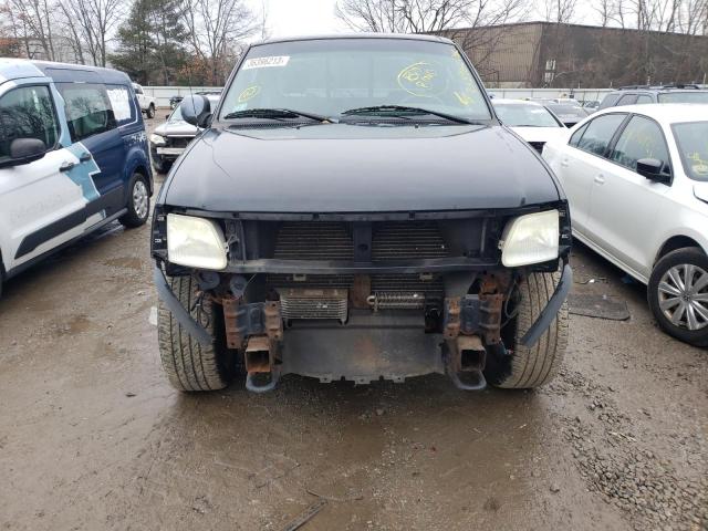 2FTRX18WX4CA21048 - 2004 FORD F-150 HERI BLACK photo 5