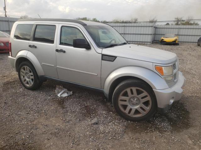 1D4PT4GK6BW597016 - 2011 DODGE NITRO HEAT GRAY photo 4