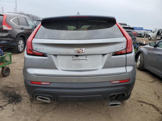 1GYAZAR45PF110226 - 2023 CADILLAC XT4 LUXURY SILVER photo 6