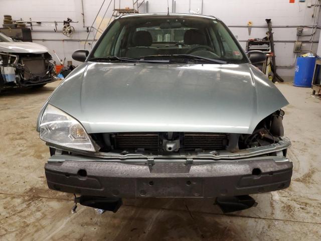 1FAFP34N06W217573 - 2006 FORD FOCUS ZX4 GREEN photo 5