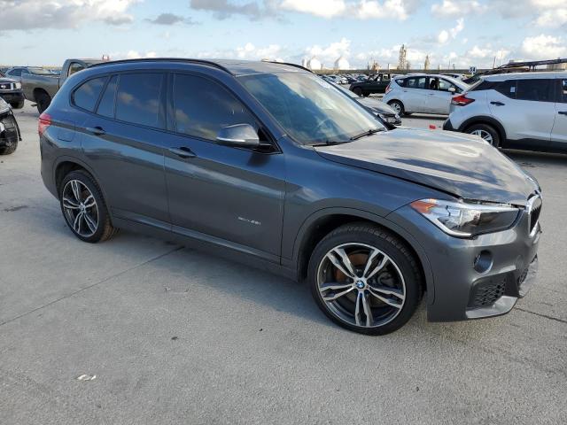 WBXHU7C3XJ5H38906 - 2018 BMW X1 SDRIVE28I GRAY photo 4