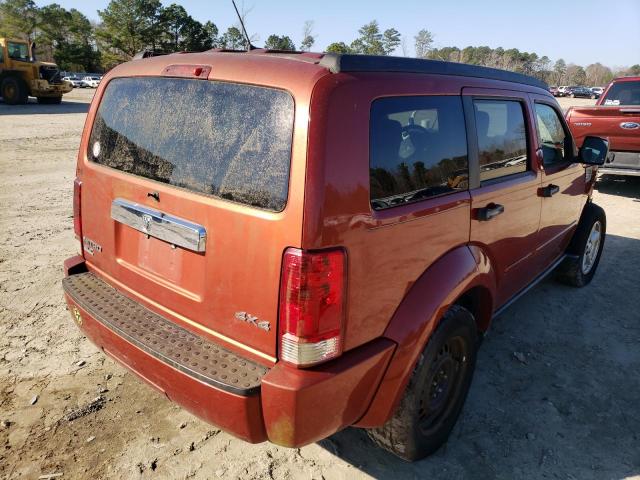 1D8GU58K57W560238 - 2007 DODGE NITRO SLT ORANGE photo 4