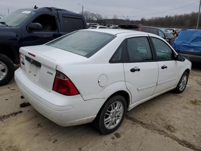 1FAFP34N65W147124 - 2005 FORD FOCUS ZX4 WHITE photo 3