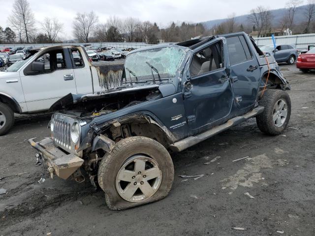 1J4GA59158L525838 - 2008 JEEP WRANGLER U SAHARA GRAY photo 1