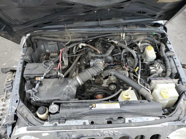 1J4GA59158L525838 - 2008 JEEP WRANGLER U SAHARA GRAY photo 11