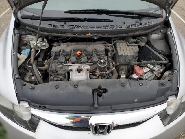 19XFA16559E026596 - 2009 HONDA CIVIC LX SILVER photo 11