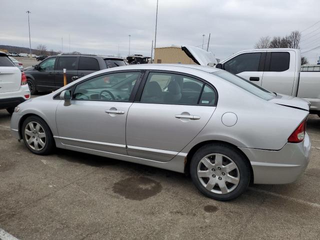 19XFA16559E026596 - 2009 HONDA CIVIC LX SILVER photo 2