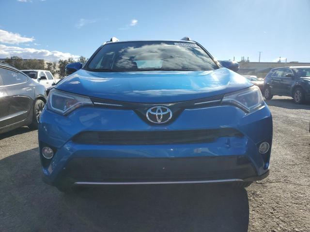 JTMWFREV5GJ099419 - 2016 TOYOTA RAV4 XLE BLUE photo 5