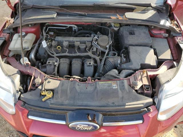 1FAHP3F2XCL260309 - 2012 FORD FOCUS SE RED photo 11