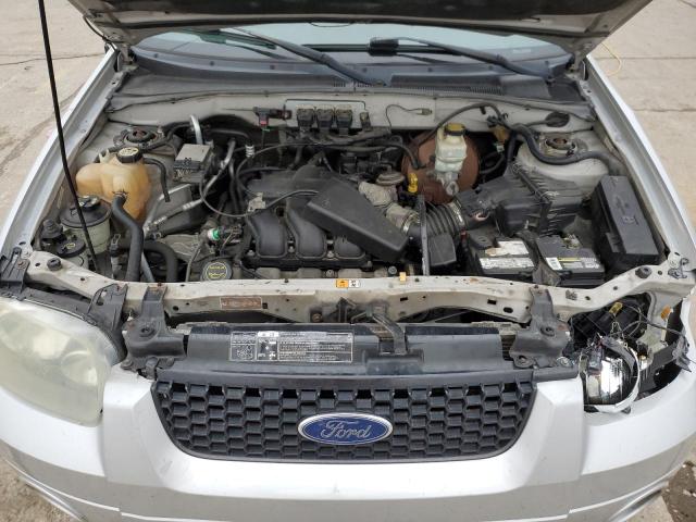 1FMCU94165KA85250 - 2005 FORD ESCAPE LIMITED SILVER photo 11